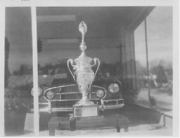 1955 Fina Sport Convertible circa 1960 in Norwalk showroom with’56 Philadelphia Autorama trophy