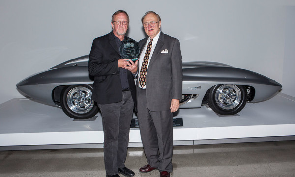 Sam Posey receiving award from Eric Dahlquist, Sr. (Head Judge – Books, Motor Press Guild)