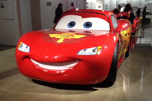 Lightning McQueen, star of the film “Cars”, welcomes kids to the Industry floor